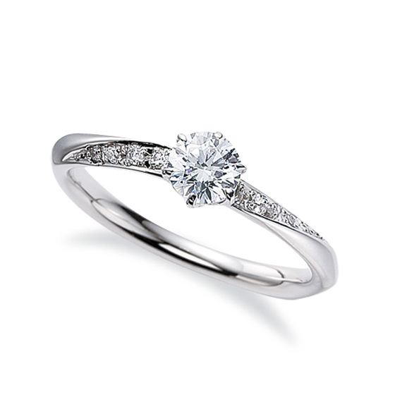 流れるように描く流線形が美しい結婚指輪。まるで流れ星のように中央のダイヤモンドが輝きを放ちます。