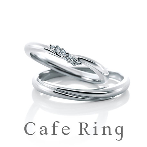 ツメ留めのダイヤモンドがセッティングされたエレガントな結婚指輪。